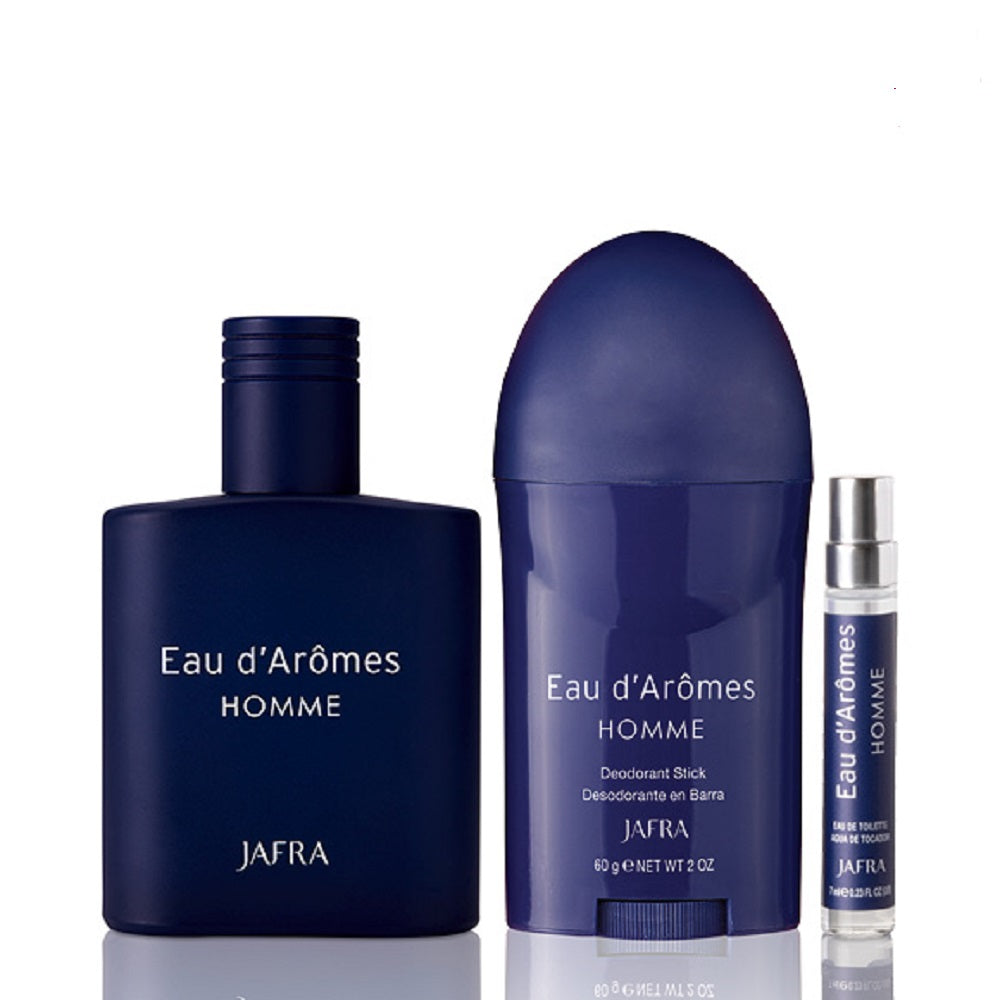 A set of Jafra Eau d'Arômes Homme fragrance products, including a large blue bottle, a smaller white bottle, and a purple mini bottle, all with the branding visible. solo en obsequiosvero
